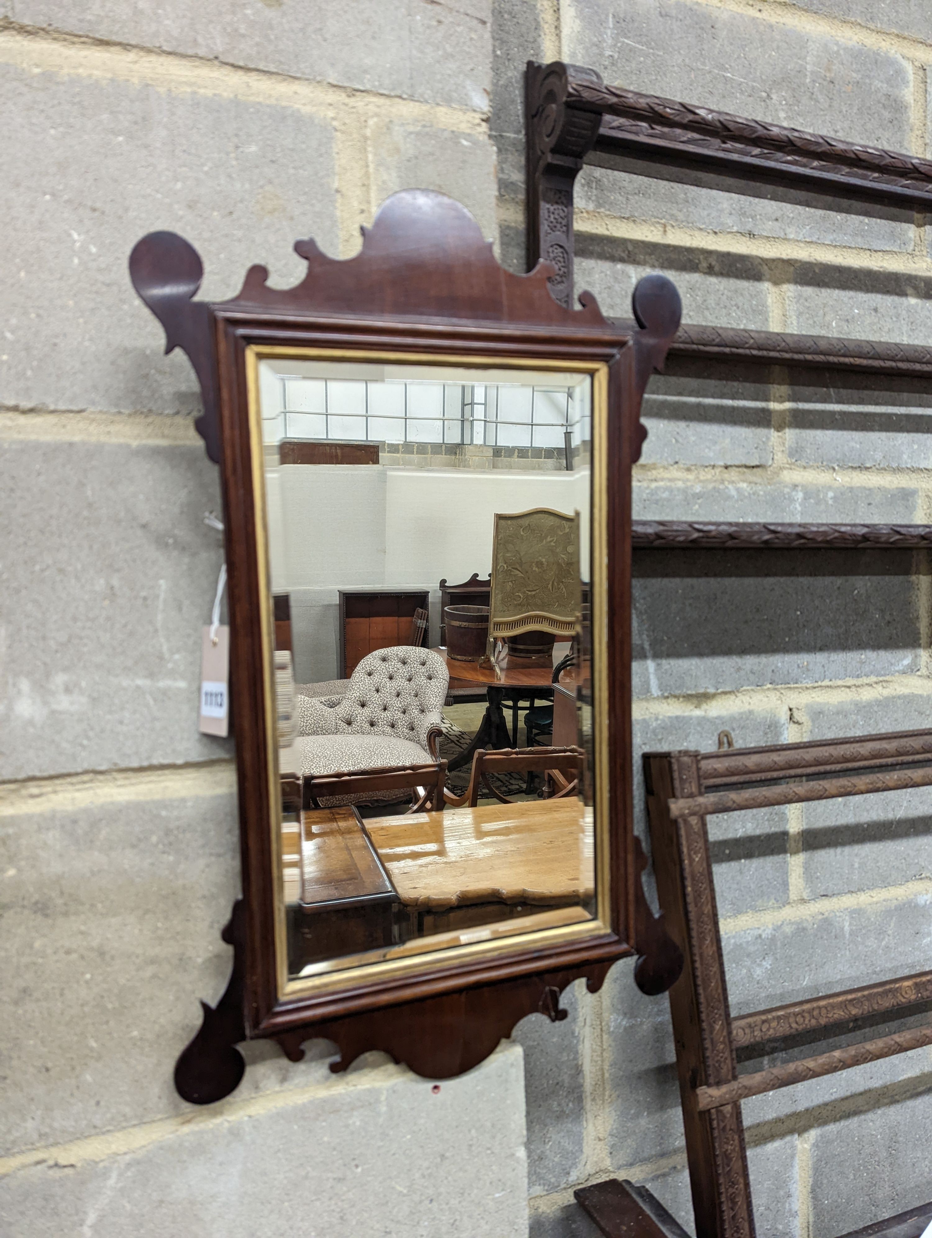 A George III mahogany fret frame wall mirror, height 63cm, width 39cm